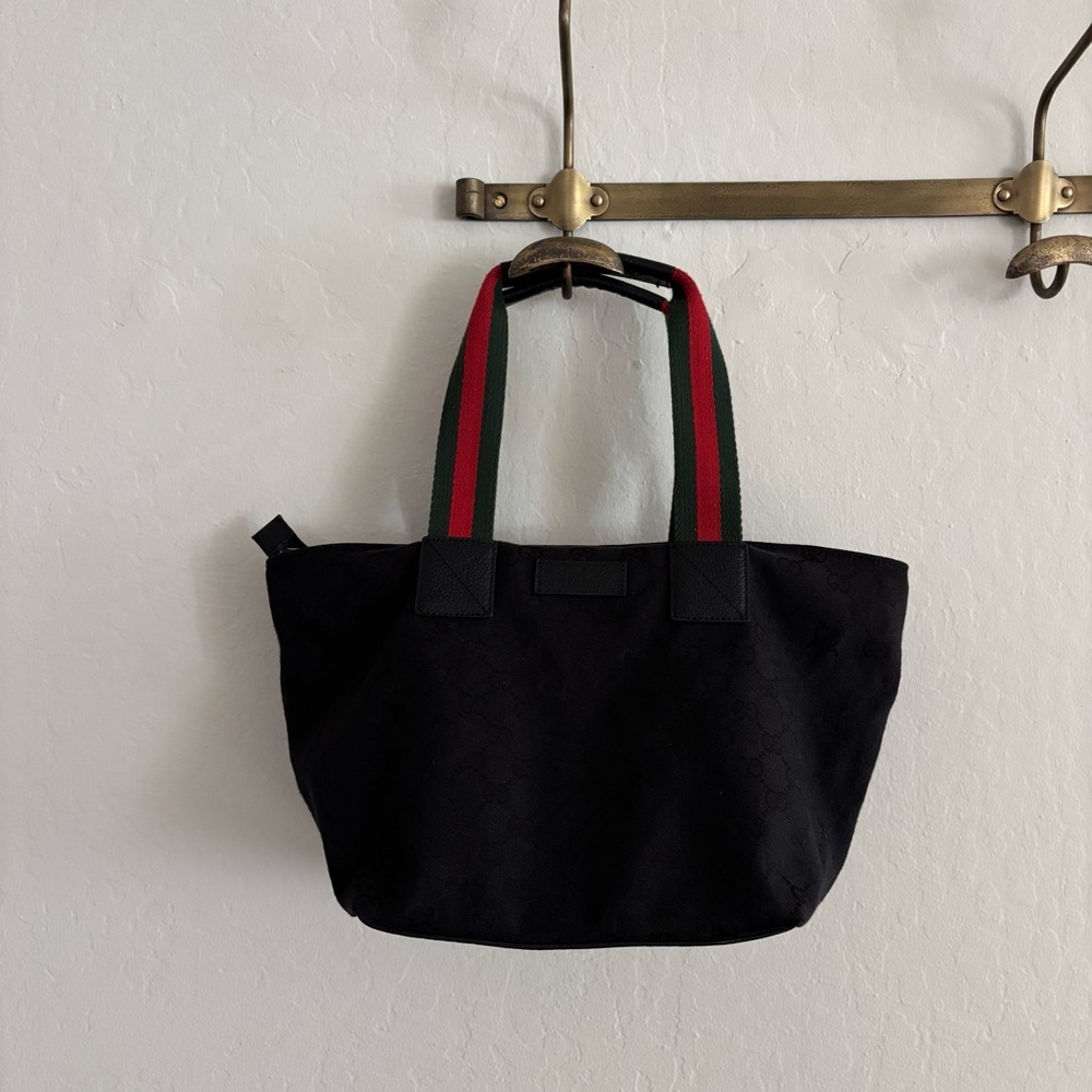 Gucci GG Canvas Sherry Line tote bag with the signature red and green handles
